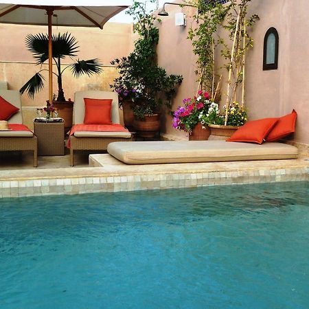 里亚德摩洛哥传统庭院住宅 马拉喀什 外观 照片 A swimming pool in Morocco